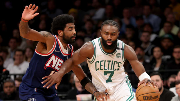 Jaylen Browns wears Yeezy's and Kyrie Irving wears Nike Dunks when hanging out with Kanye West.